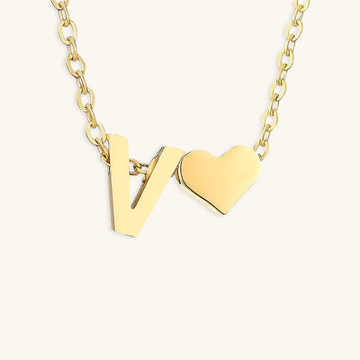 navnesmykke med initialen Ria | 18k Guld
